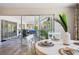 Dining area with view to the enclosed lanai at 217 Giotto Dr, Nokomis, FL 34275