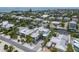 Aerial view of a home in a waterfront community with canals and lush landscaping at 224 Chilson Ave, Anna Maria, FL 34216