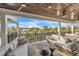 Relaxing balcony with comfortable seating and panoramic views of the surrounding landscape at 224 Chilson Ave, Anna Maria, FL 34216