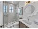 Stylish bathroom featuring a glass shower, contemporary vanity, and decorative tile flooring at 224 Chilson Ave, Anna Maria, FL 34216
