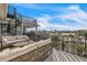 Balcony deck with comfortable seating, spiral staircase, and lovely canal views at 224 Chilson Ave, Anna Maria, FL 34216