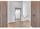 Hallway featuring a modern elevator and stylish stairwell at 224 Chilson Ave, Anna Maria, FL 34216