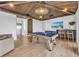 Game room featuring vaulted ceilings, a billiards table, and access to an elevator at 224 Chilson Ave, Anna Maria, FL 34216