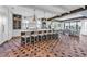 Large kitchen features a spacious island, counter seating, pendant lighting, and stainless steel appliances at 224 Chilson Ave, Anna Maria, FL 34216