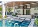 Amazing outdoor space with a swim up bar, wooden ceiling and covered porch at 224 Chilson Ave, Anna Maria, FL 34216