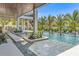 Luxury pool with fountains and landscaping, perfect for relaxing and entertaining at 224 Chilson Ave, Anna Maria, FL 34216