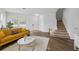 Cozy living room with modern decor, wood floors, and plenty of natural light at 25364 Tether Ln, Punta Gorda, FL 33983