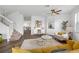 Inviting living room with modern decor, wood floors, and staircase access at 25364 Tether Ln, Punta Gorda, FL 33983
