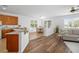 Open living space featuring a seamless transition from the kitchen to dining and living areas at 25364 Tether Ln, Punta Gorda, FL 33983