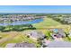 Beautiful home located on a well-manicured lot, backing onto a golf course and lake at 302 Crystal Downs Ct, Sun City Center, FL 33573