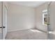 Cozy bedroom featuring a window and closet at 302 Crystal Downs Ct, Sun City Center, FL 33573