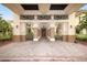 A grand building entrance with ornate design and beautiful brick pavers at 302 Crystal Downs Ct, Sun City Center, FL 33573