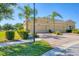 Well-maintained home with three-car garage, mature landscaping, and a brick-paved driveway at 302 Crystal Downs Ct, Sun City Center, FL 33573