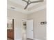 Bright hallway with view of kitchen and a bedroom at 302 Crystal Downs Ct, Sun City Center, FL 33573