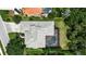 Aerial view showcasing roof and pool, nestled in a well-maintained neighborhood at 3738 Eagle Hammock Dr, Sarasota, FL 34240