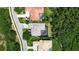 Overhead shot of home with a private pool, surrounded by lush landscaping in a residential neighborhood at 3738 Eagle Hammock Dr, Sarasota, FL 34240