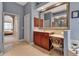 A charming bathroom features a makeup vanity, sink, and soaking tub for a relaxing retreat at 3738 Eagle Hammock Dr, Sarasota, FL 34240