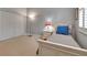 Comfortable bedroom featuring a bed with a nightstand, and closet, showcasing a functional and relaxing space at 3738 Eagle Hammock Dr, Sarasota, FL 34240