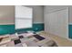Comfortable bedroom featuring a bed with a decorative quilt, a window, and closet, showcasing a functional and relaxing space at 3738 Eagle Hammock Dr, Sarasota, FL 34240