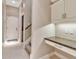 Hallway with built-in desk and cabinet space next to stairway at 3738 Eagle Hammock Dr, Sarasota, FL 34240