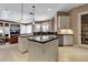 Spacious kitchen boasts an island, granite counters, and seamless flow to the living area at 3738 Eagle Hammock Dr, Sarasota, FL 34240