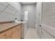 Functional laundry room equipped with a washer, dryer, storage cabinets, and a shelving, offering convenience and organization at 3738 Eagle Hammock Dr, Sarasota, FL 34240