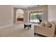 Comfortable living room provides access to outdoor pool area and an open floorplan at 3738 Eagle Hammock Dr, Sarasota, FL 34240