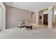 Spacious living room with neutral tones, flowing into foyer and other living areas at 3738 Eagle Hammock Dr, Sarasota, FL 34240