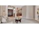 Open concept living room showcases seamless flow to dining area and grand entrance at 3738 Eagle Hammock Dr, Sarasota, FL 34240