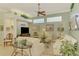 Inviting living room featuring neutral tones, ample natural light, and elegant decor at 410 Wellington, Venice, FL 34292