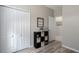 Neutral bedroom with plank flooring, storage cubes and closet at 4318 Deep Creek Ter, Parrish, FL 34219