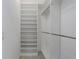Organized walk-in closet with adjustable shelving and ample storage space for clothes and accessories at 4318 Deep Creek Ter, Parrish, FL 34219