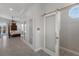 Spacious bedroom with decorative sliding door and view to the backyard pool area at 4355 Pompano Ln, Palmetto, FL 34221