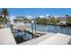 Private boat lift, ready for use, ensuring easy water access at 4355 Pompano Ln, Palmetto, FL 34221