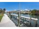 Close-up of a private boat lift providing convenient waterfront access at 4355 Pompano Ln, Palmetto, FL 34221