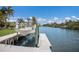 A waterfront home featuring a private boat dock on the canal with a boat lift, boat and waterway views at 4355 Pompano Ln, Palmetto, FL 34221