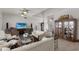 Open concept living room and foyer boasting natural light, comfortable seating, and elegant decor at 4355 Pompano Ln, Palmetto, FL 34221