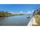 Scenic waterfront view showcases the calm canal and multiple boat docks at 4355 Pompano Ln, Palmetto, FL 34221