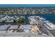 Aerial view of neighborhood with canal access and beautiful waterfront homes at 444 63Rd St, Holmes Beach, FL 34217