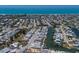 Aerial view of a waterfront community with canal access and beautiful ocean views at 444 63Rd St, Holmes Beach, FL 34217