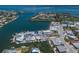 Aerial view of waterfront homes with docks along the canals in a sunny community at 444 63Rd St, Holmes Beach, FL 34217