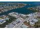 Aerial view of waterfront homes with docks along the canals in a sunny community at 444 63Rd St, Holmes Beach, FL 34217