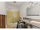 Bathroom with partially exposed walls and ceiling and outdated tub, toilet and sink at 444 63Rd St, Holmes Beach, FL 34217