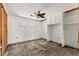 Bedroom with a ceiling fan, partially exposed walls and an unfinish floor at 444 63Rd St, Holmes Beach, FL 34217