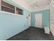 Entrance way with geometric cinderblock accent wall and aqua wall at 444 63Rd St, Holmes Beach, FL 34217
