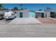 Unique exterior with parking, brick pavers, and retro awning at 444 63Rd St, Holmes Beach, FL 34217