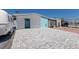 Charming home featuring geometric cinderblock accent walls and a paved drive at 444 63Rd St, Holmes Beach, FL 34217