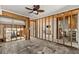 Spacious living room with unfinished walls and ceiling ready for your personal touch at 444 63Rd St, Holmes Beach, FL 34217