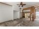 Main bedroom with a ceiling fan, partially exposed walls and an unfinish floor at 444 63Rd St, Holmes Beach, FL 34217