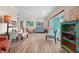 Spacious living room featuring stylish decor, hardwood floors, and plenty of natural light at 4440 Yacht Club Dr, Venice, FL 34293